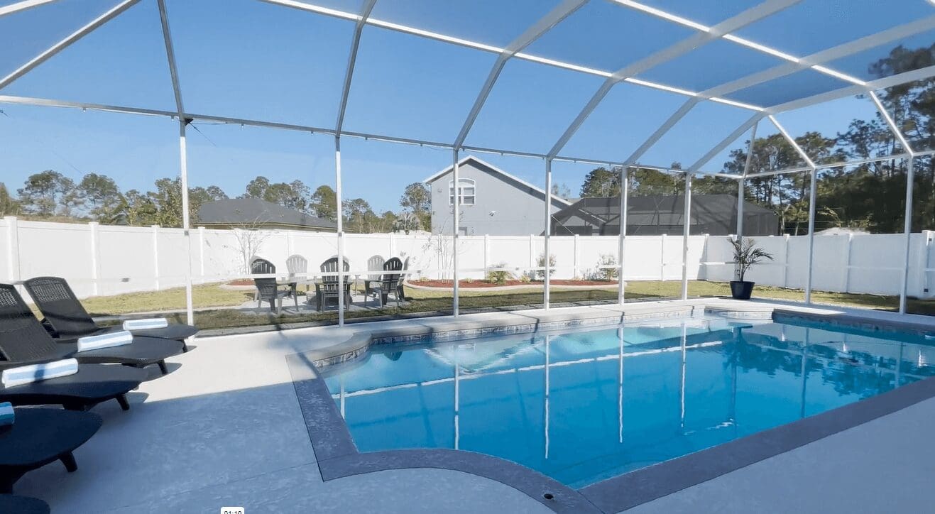 A pool with an enclosure in the middle of it